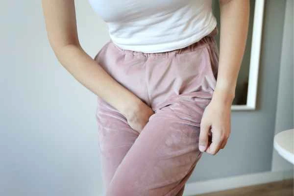 woman running for the toilet because of urinary incontinence Westbourne Green